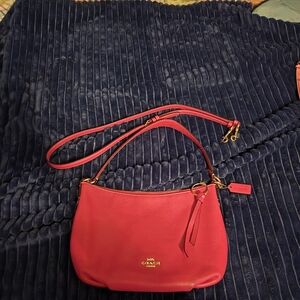 Coach bright pink gently used  adjustable shoulder bag